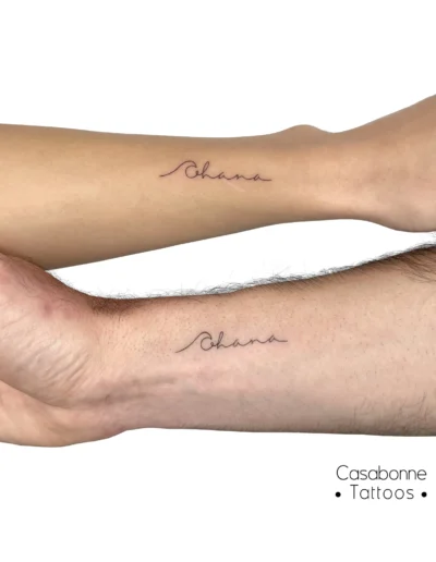 Tatouage assorti du mot 'Ohana', sur l'avant-bras, à Toulouse (tatouage en duo)